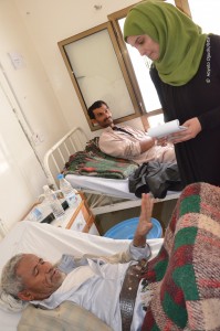 Malak Shaher interviews a patient